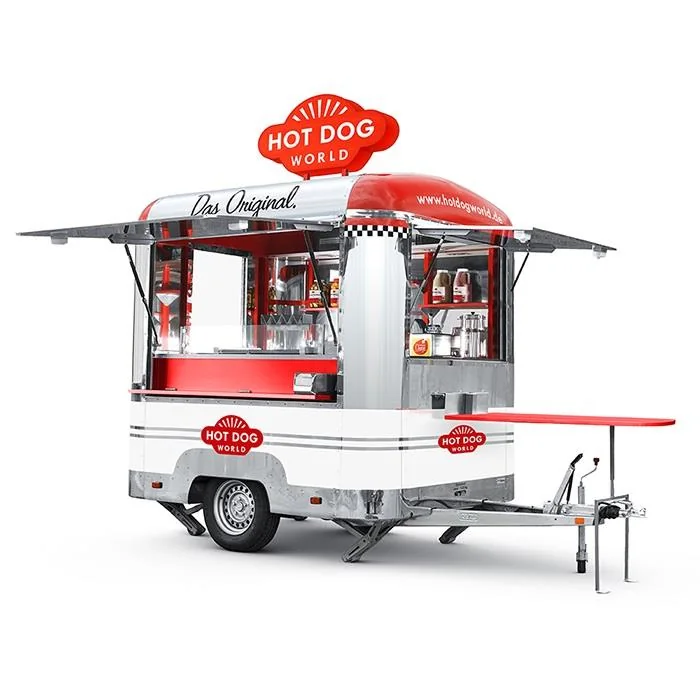 Remorque hot dog blanche et rouge avec auvent ouvert, comptoir latéral et timon.